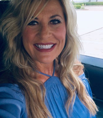 Portrait of Lorri Green, REALTOR® GRI.