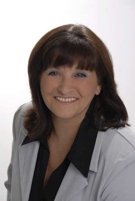 Portrait of Rhonda Cochrane, REALTOR®, GRI, CHMS, AHWD