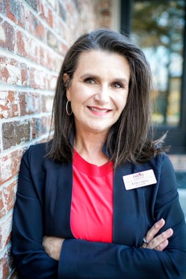 Portrait of Kelley Adams, REALTOR®, GRI, ABR